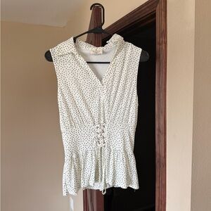 Polka Dot Sleeveless Peplum Tank Top in White